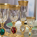 Set 12 People - 48 Pieces, 
For Each Person:
1 - Water Glass
1- Wine Glass 
1 - Flute
1- Spirit Glass - Tableware - Modenese Luxury Furniture & Lightings - antique flatware, baroque glassware, best glassware, bronze luxury set, champagne glass, classic baroque luxury decor for table, classic design glassware, classic italian tableware, classic luxury cutlery, classic luxury glassware, classic luxury kitchen decor, classic spirit glass, crystal goblet, crystallinity, exclusive champagne flute, exclusive desi