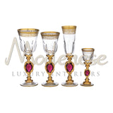 Set 24 People - 96 Pieces,
For Each Person:
1 - Water Glass
1- Wine Glass 
1 - Flute
1- Spirit Glass - Tableware - Modenese Luxury Furniture & Lightings - antique flatware, baroque glassware, best glassware, bronze luxury set, champagne glass, classic baroque luxury decor for table, classic design glassware, classic italian tableware, classic luxury cutlery, classic luxury glassware, classic luxury kitchen decor, classic spirit glass, crystal goblet, crystallinity, exclusive champagne flute, exclusive desig