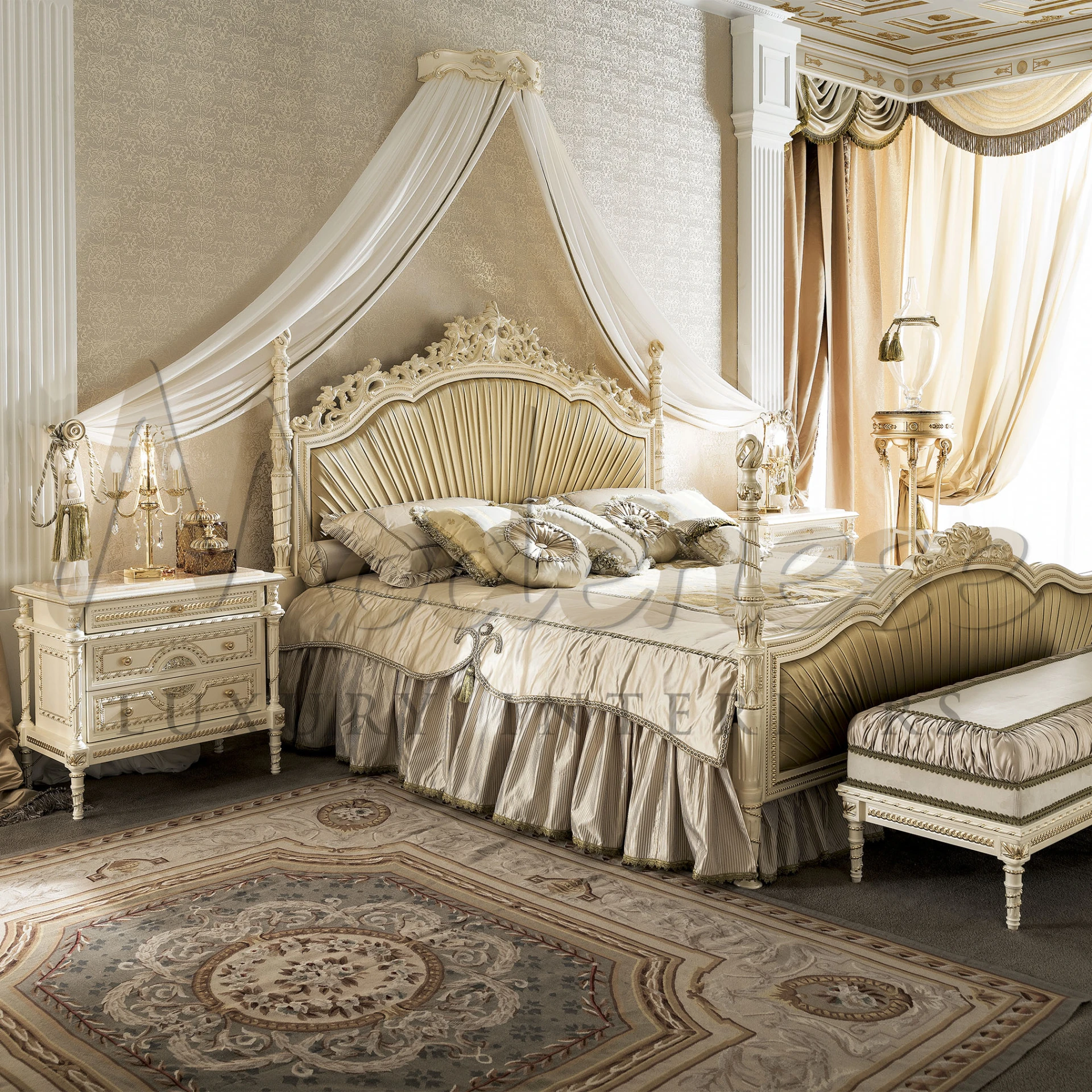 A regal bedroom featuring Modenese Furniture Manufacturer's nightstand with gold accents and marble top, matching the grand bed and elegant, draped canopy.