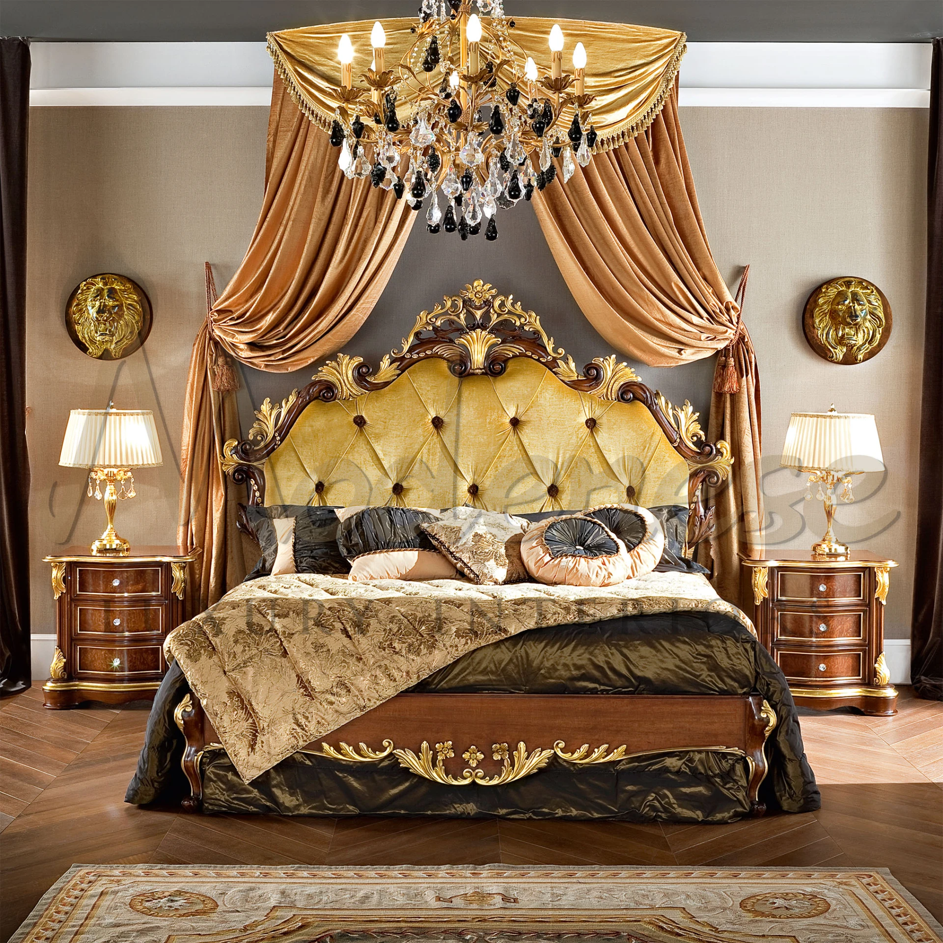 Luxurious bedroom with an ornate golden headboard, elegant chandelier, sumptuous drapes, matching bedside tables with table lamps, and opulent bedding.
