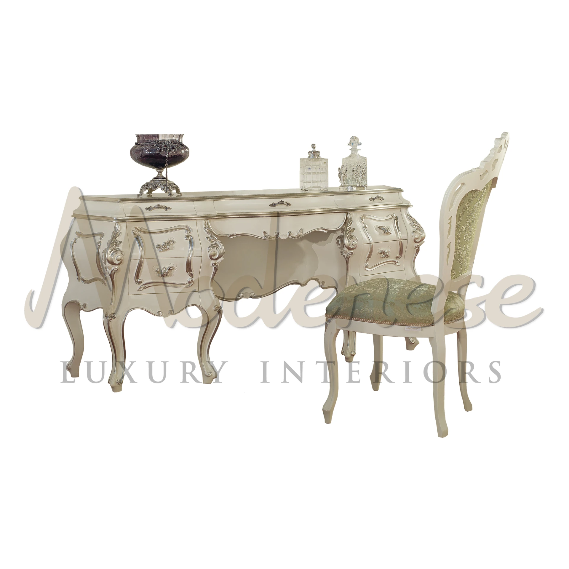 An opulent cream-colored dressing table set with ornate carvings, accompanied by a matching upholstered chair and framed mirror, complete with decorative drapery.