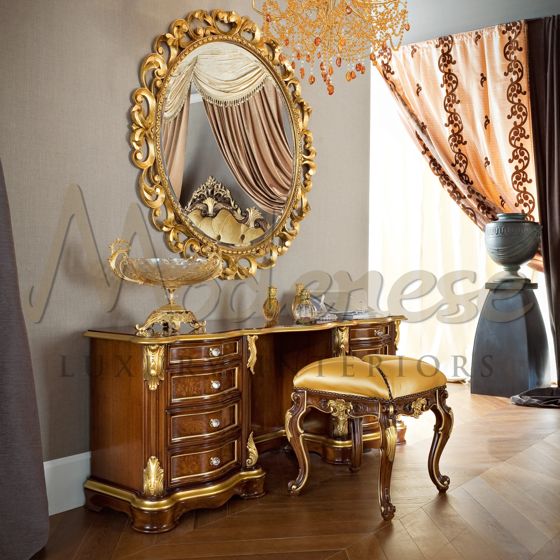 Opulent mahogany dressing table with gold leaf accents, multiple drawers, and a matching stool with golden upholstery, adorned with a decorative gold-rimmed bowl and perfume bottles.