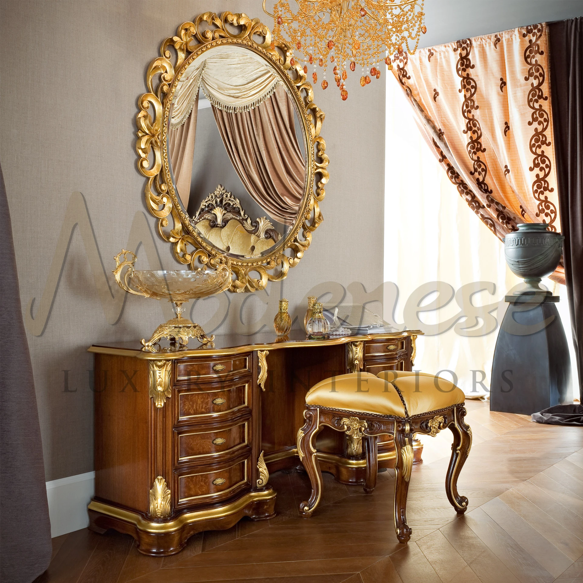 Elegant wooden chest of drawers with gold trimmings and decorative bowl.
