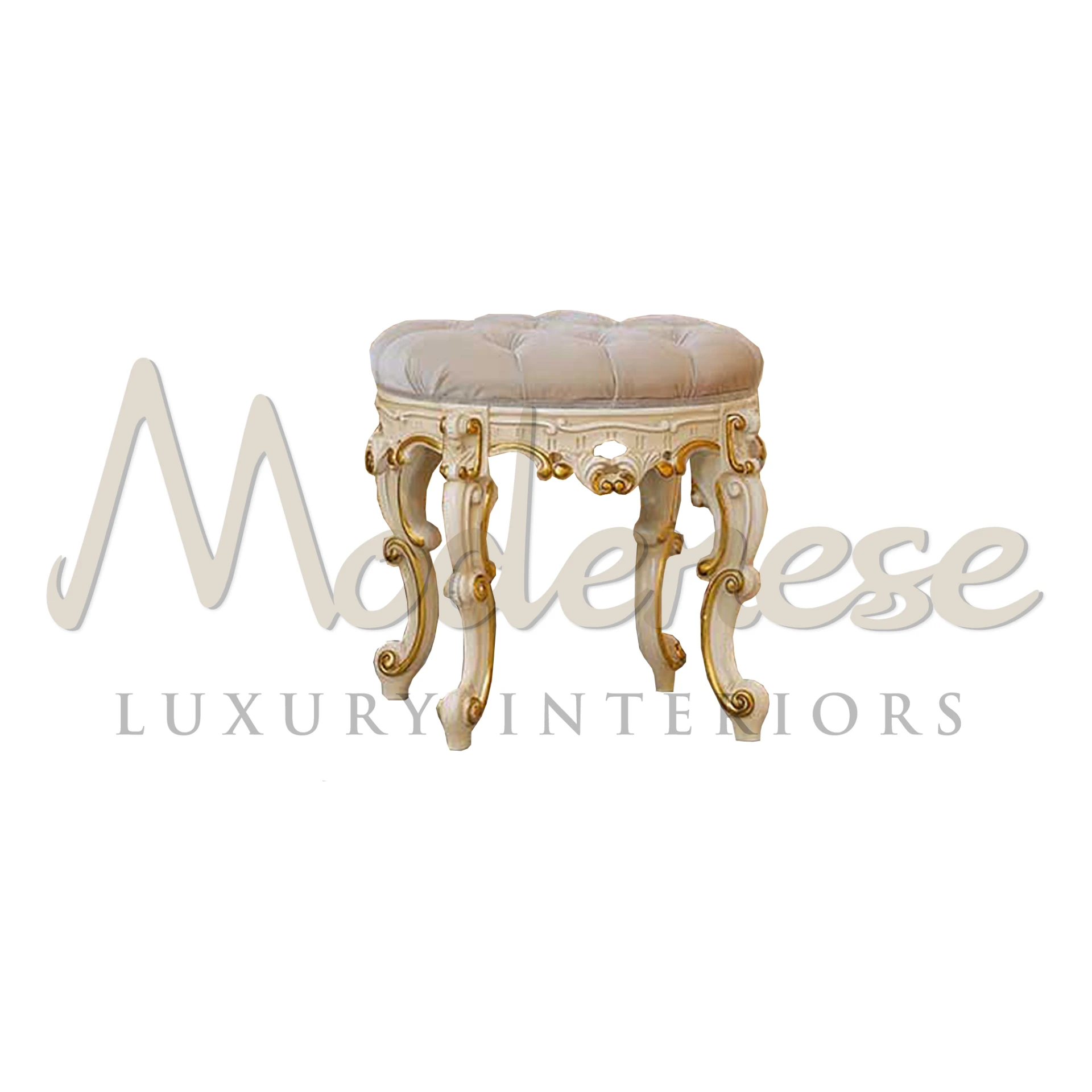 Elegant ivory upholstered vanity stool with ornamental gold detailing.                                                                                                       