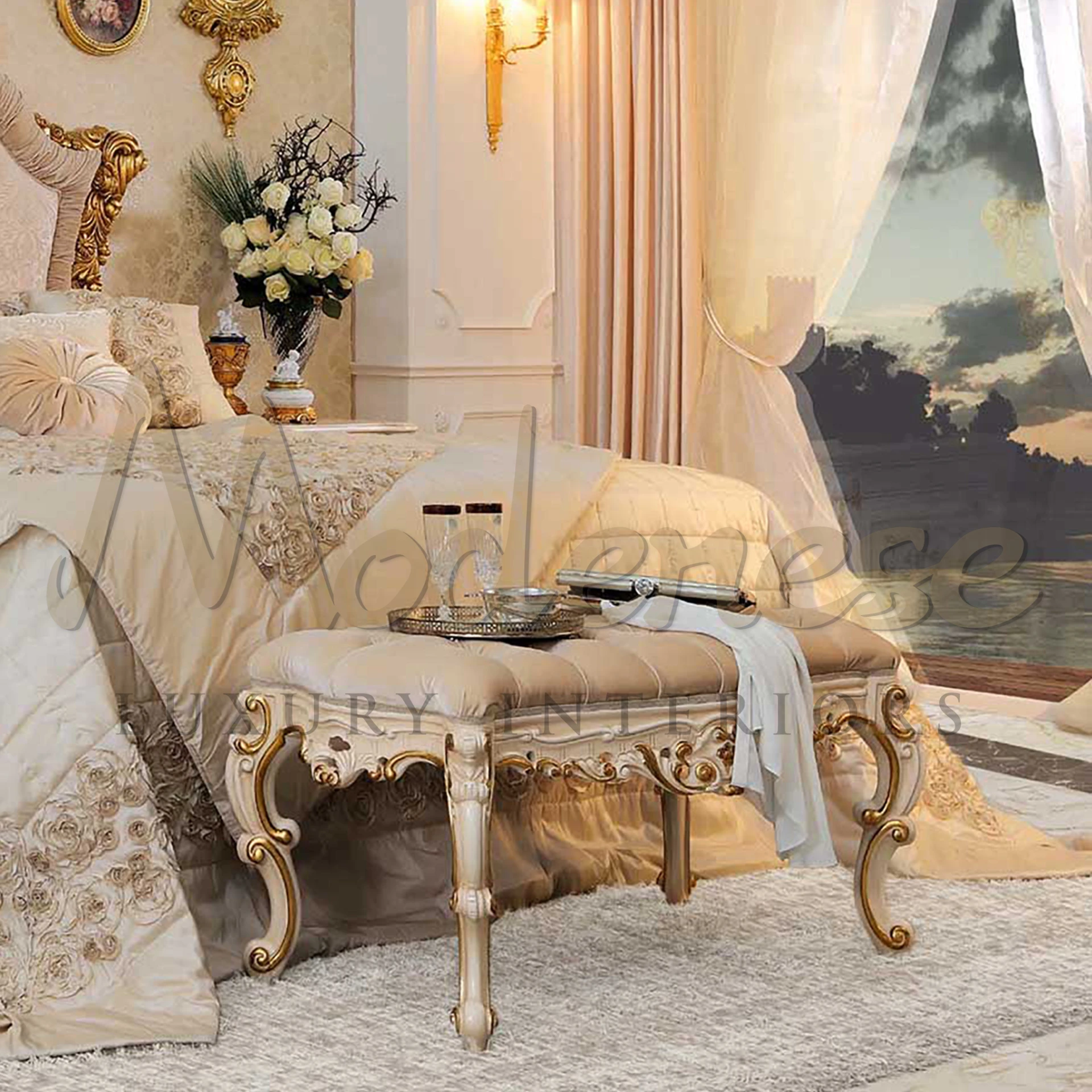 Luxurious tufted bench with rococo gold detailing and a white throw.                                                                                        