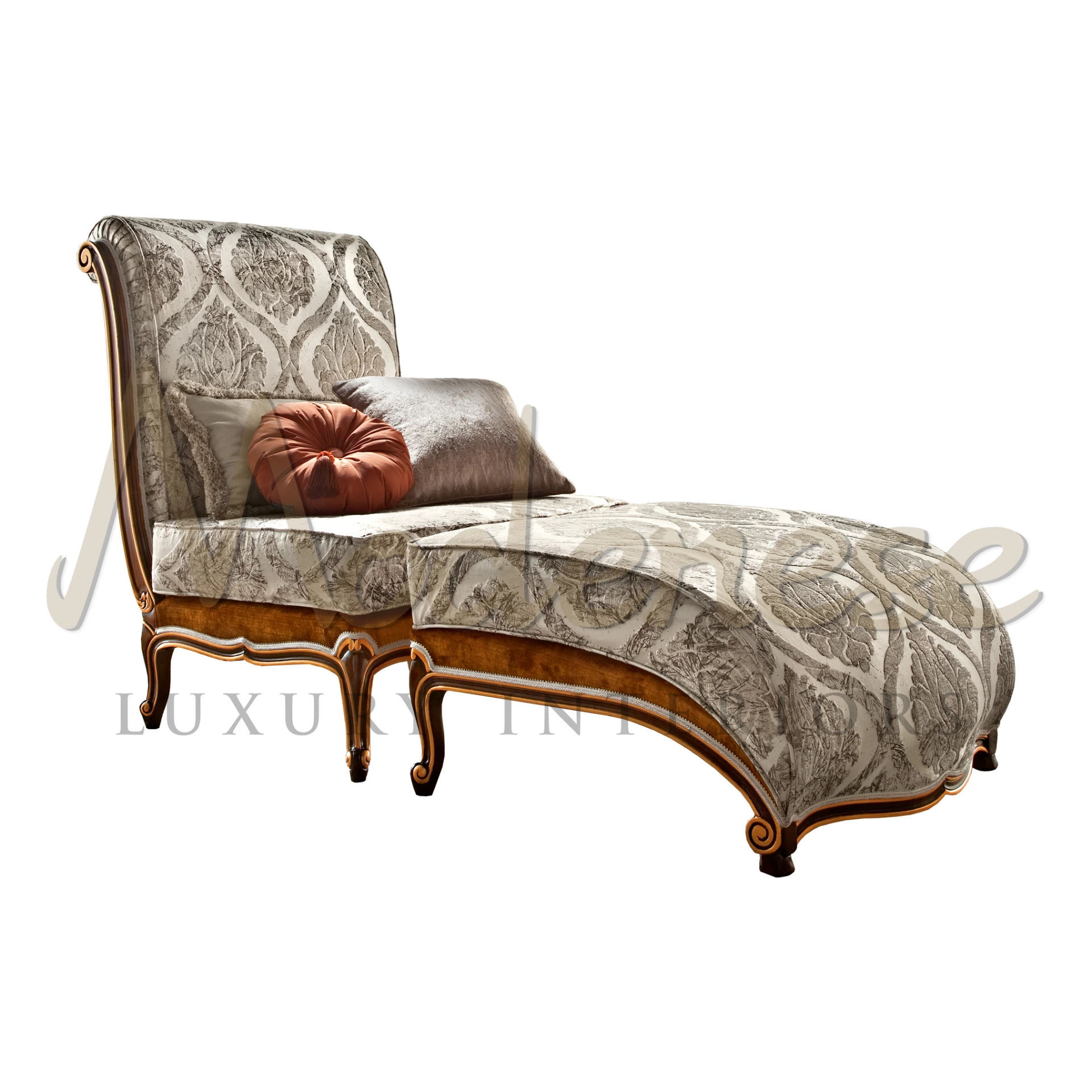 Luxurious damask-patterned chaise lounge with ornate wooden legs and plush pillows.                                                                           