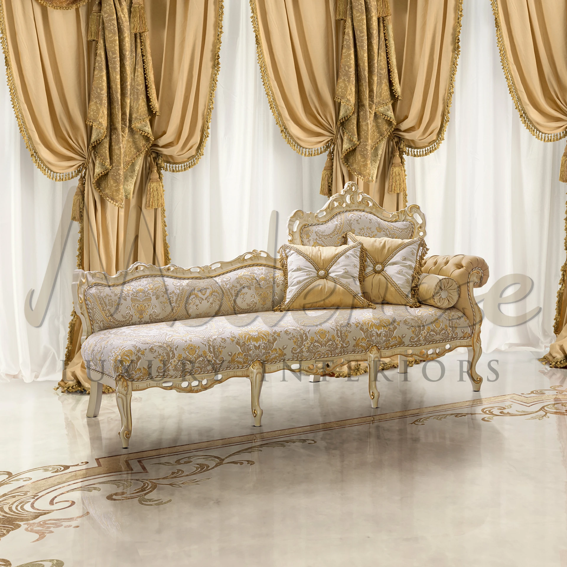 Elegant carved bench in gold with luxurious patterned upholstery and accent pillows.                                                                           