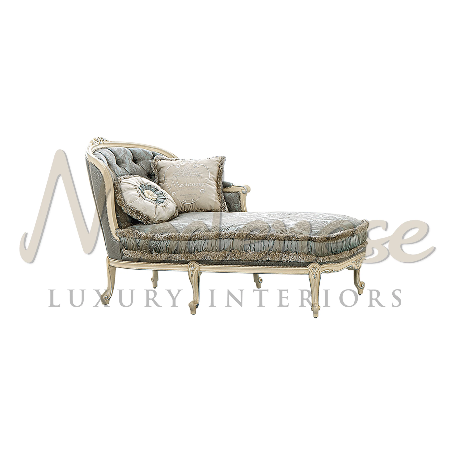 French-style chaise lounge with green fabric and ornate white woodwork.                                                                                     