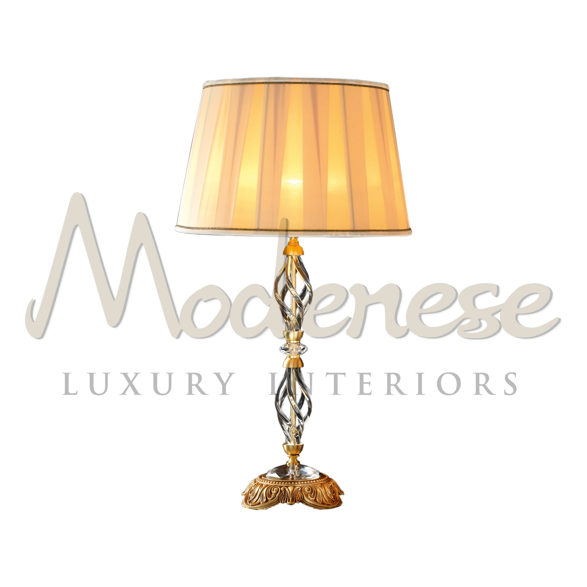 Elegant Table Lamp with a twisted brass and silver stem and warm amber shade.