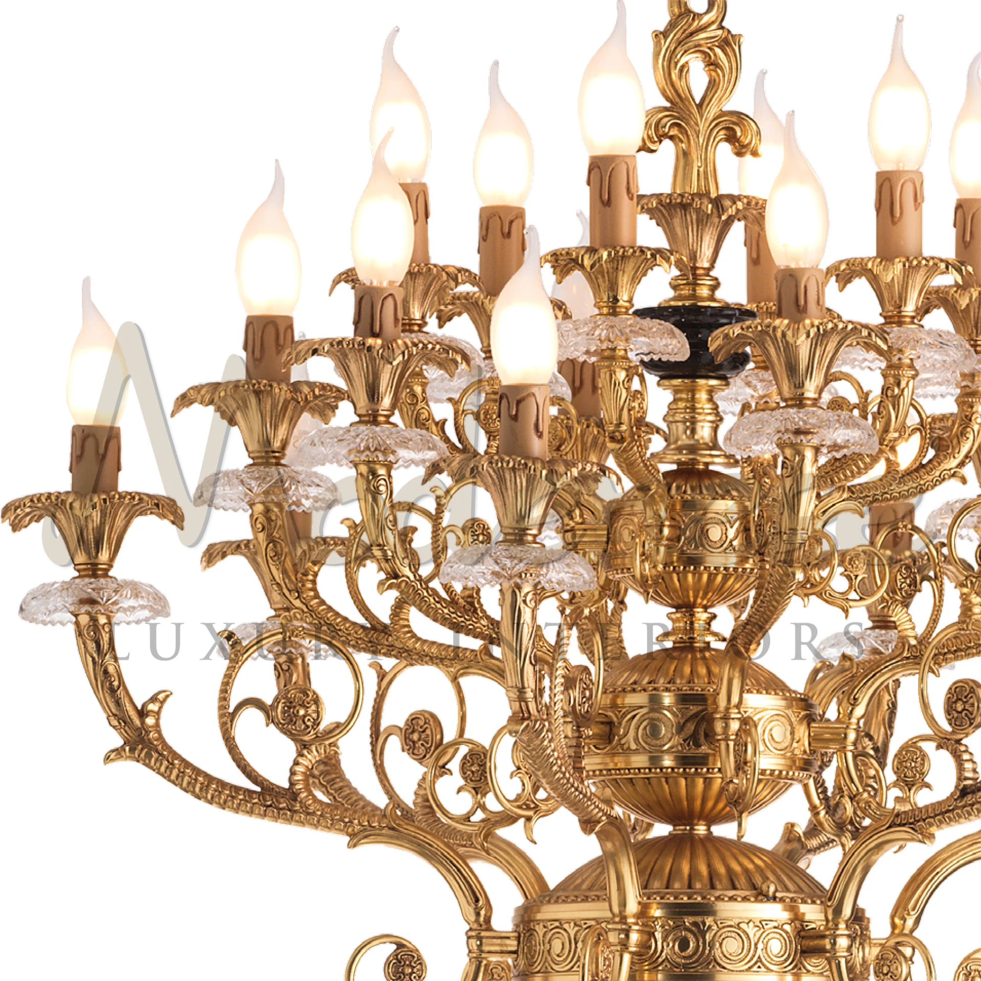 A close look at a fancy gold chandelier with crystal decorations and bulbs