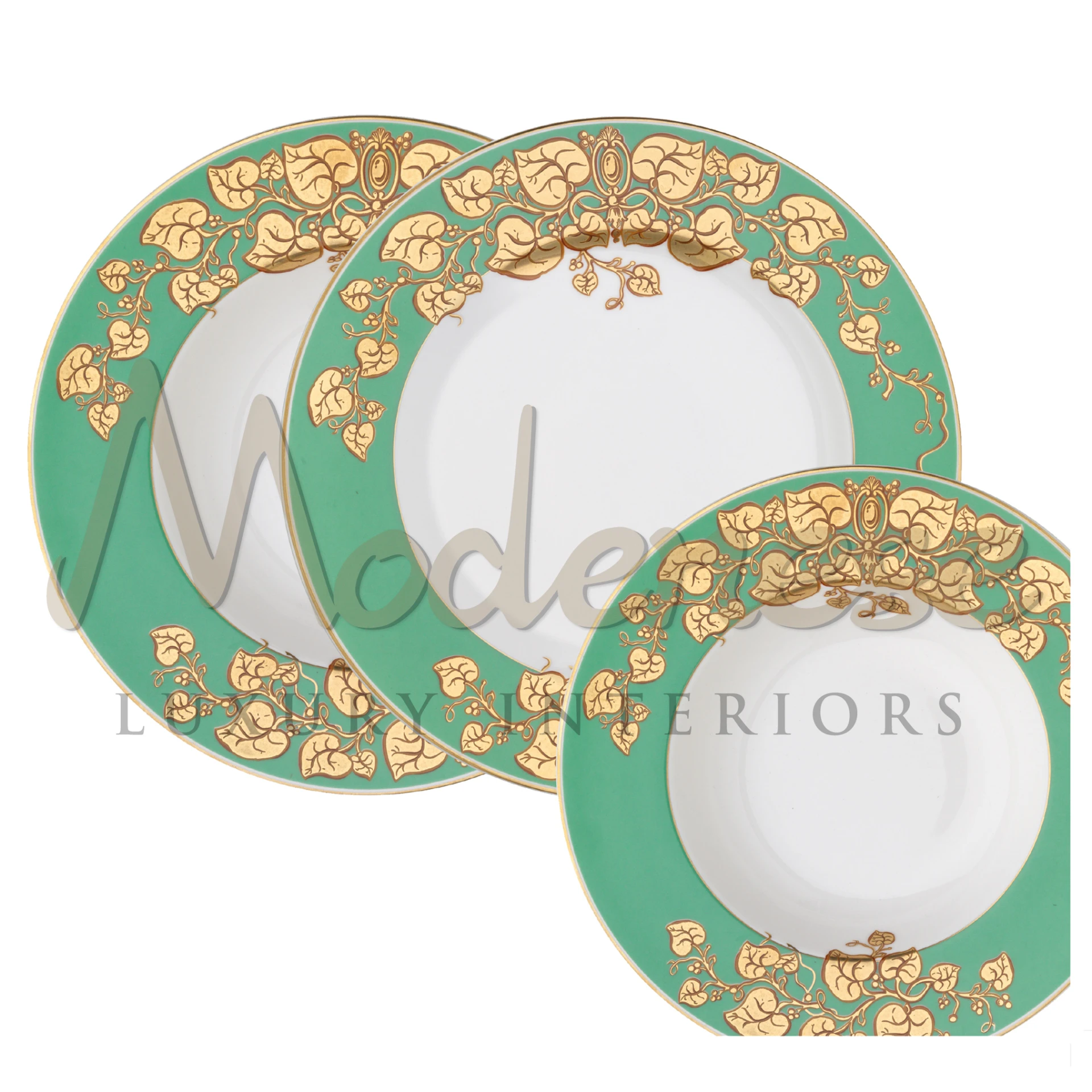 Three decorative plates with green borders and sophisticated golden designs.