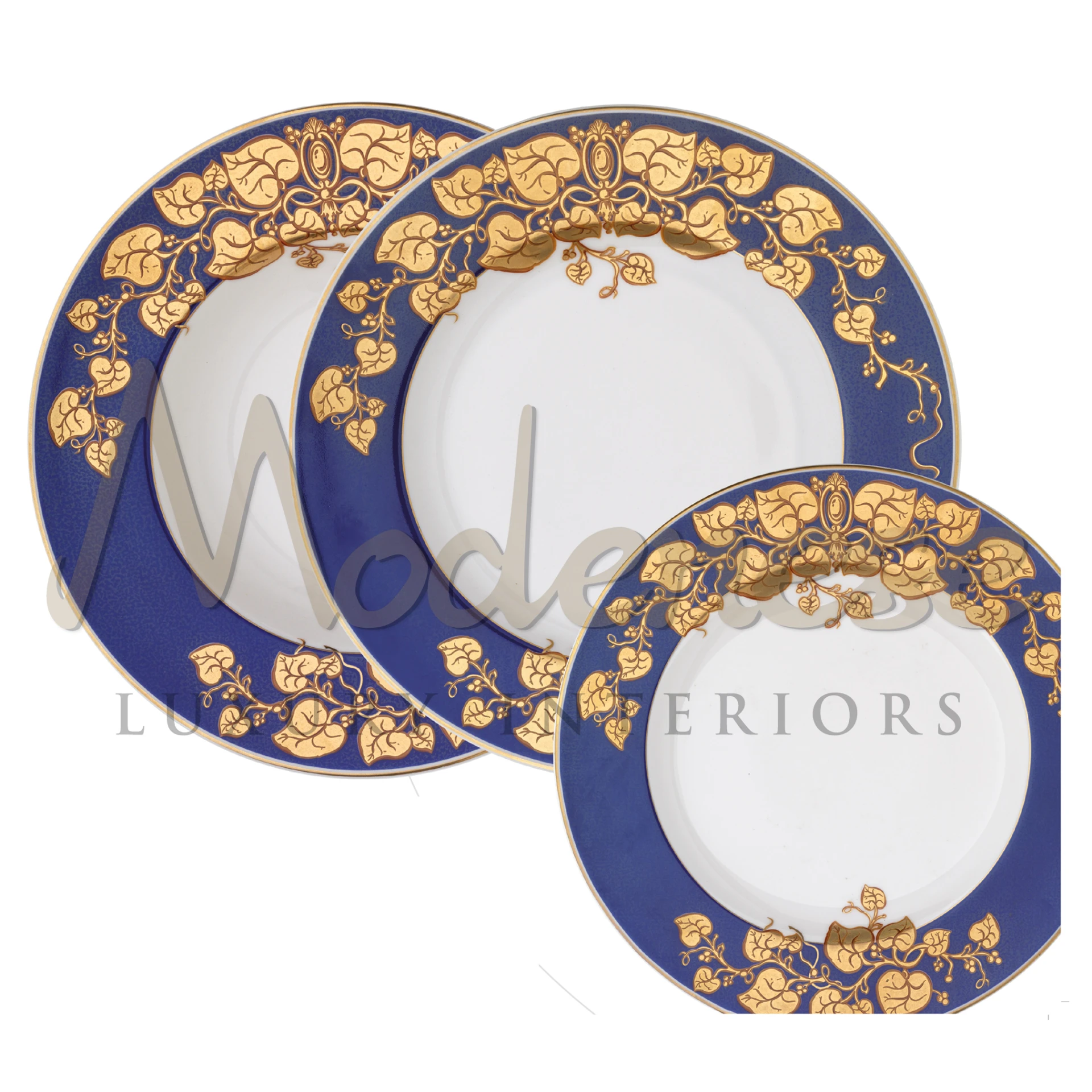 Three decorative plates with blue borders and sophisticated golden floral designs