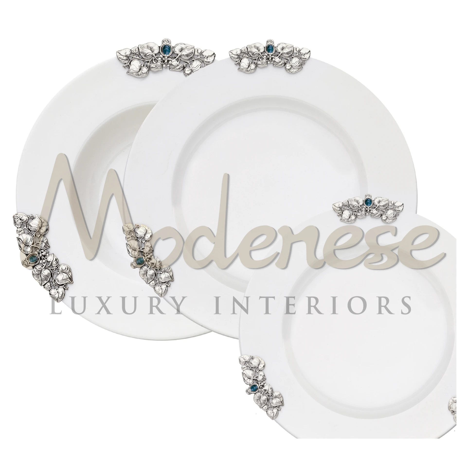 The Bronze Silver & Stone plate set with white plates and silver floral accents featuring blue gemstones.
