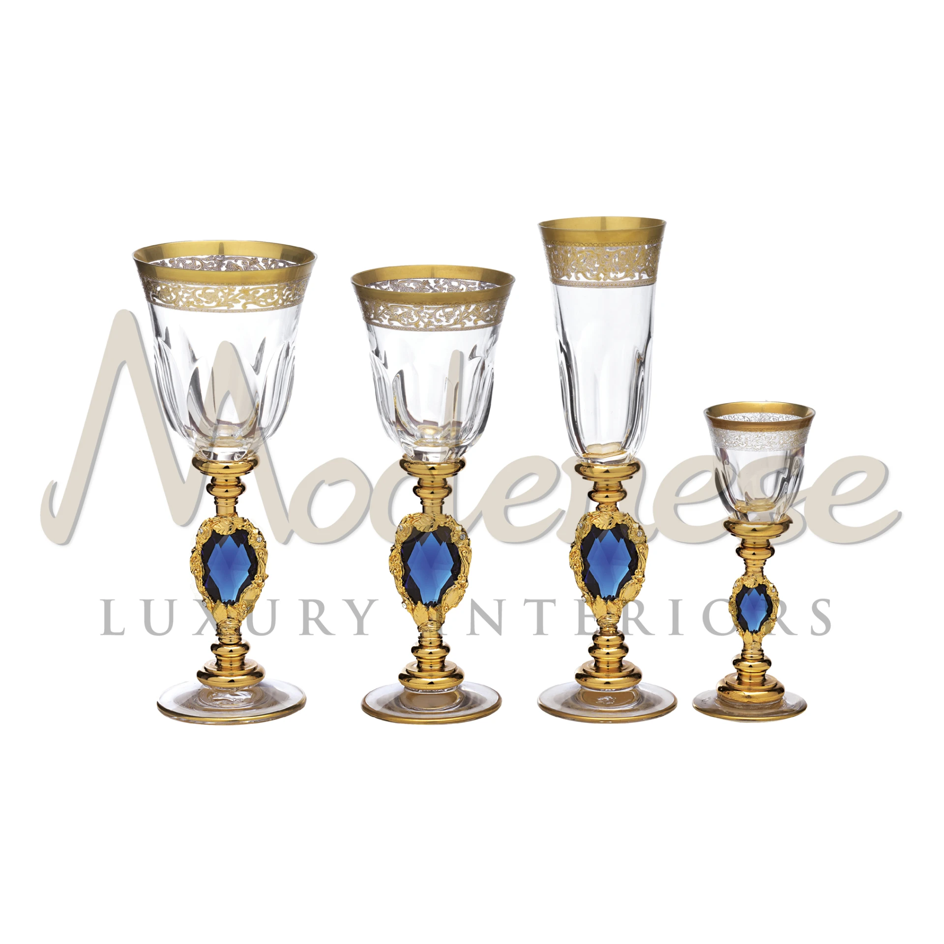 Stylish 'Blue Crystal' glassware set with gold accents and prominent blue gemstone