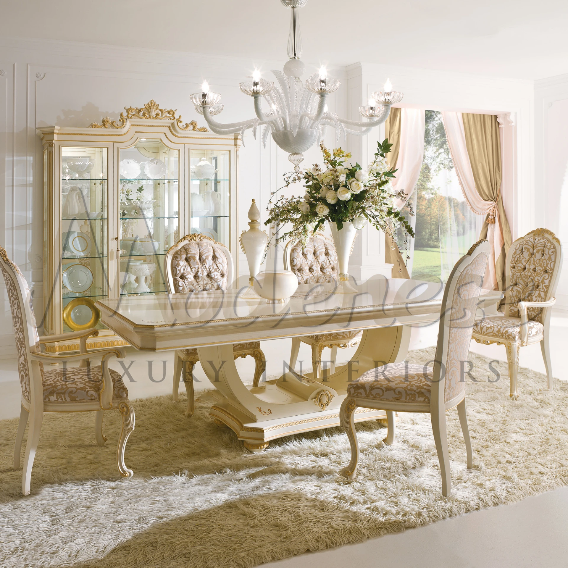 Luxurious Baroque style dining table set in a luxurious interior by Modenese Luxury Furniture.