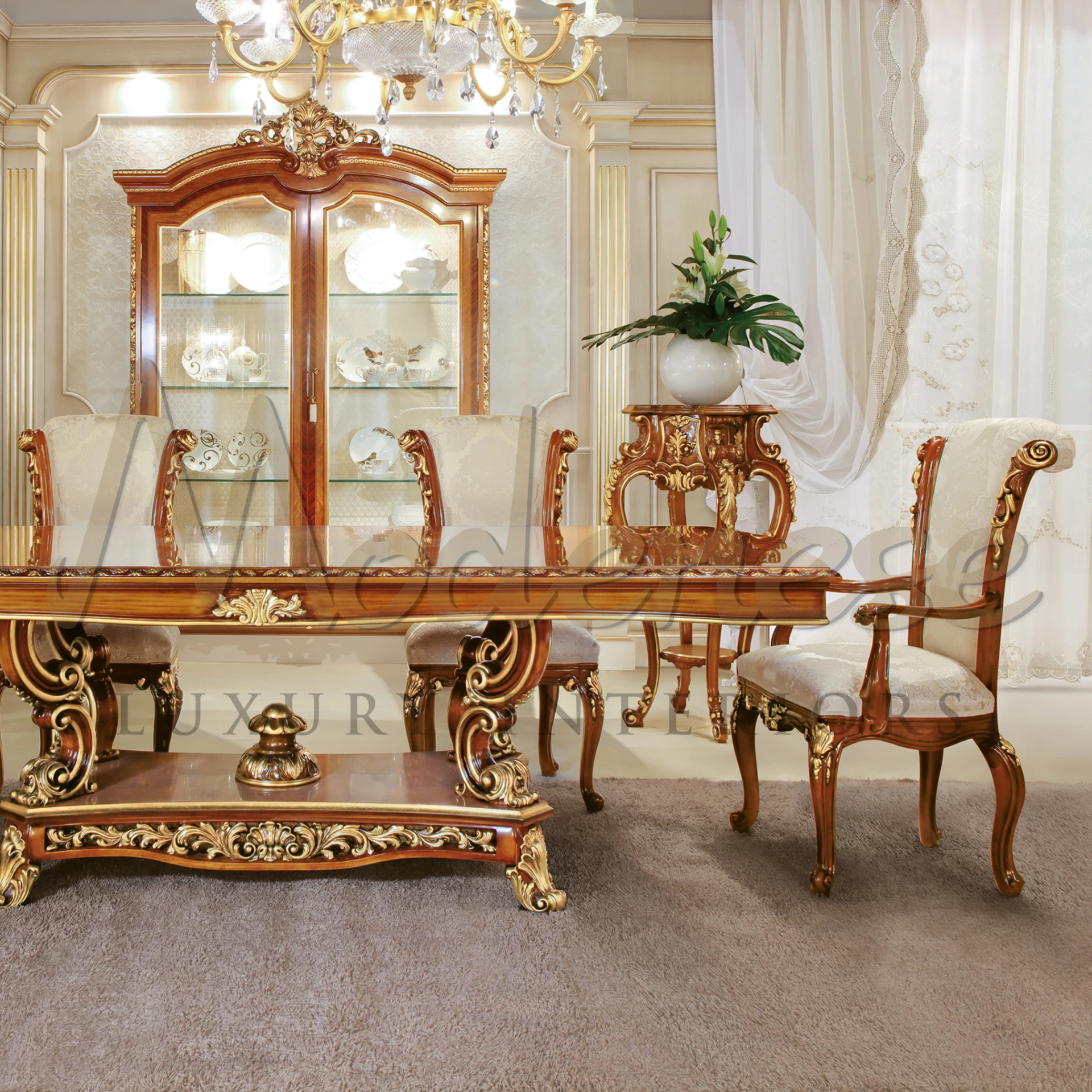 Lavish dining setting featuring a white and gold table and luxurious chairs.