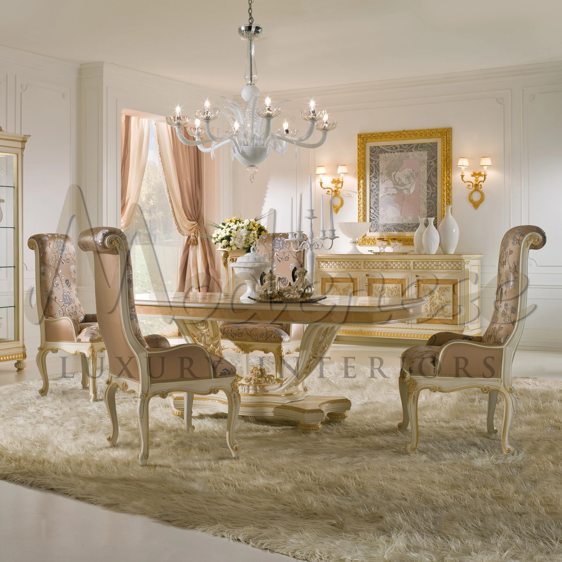Glass dining table with hand carved chairs with armrests in a classic interior setting.