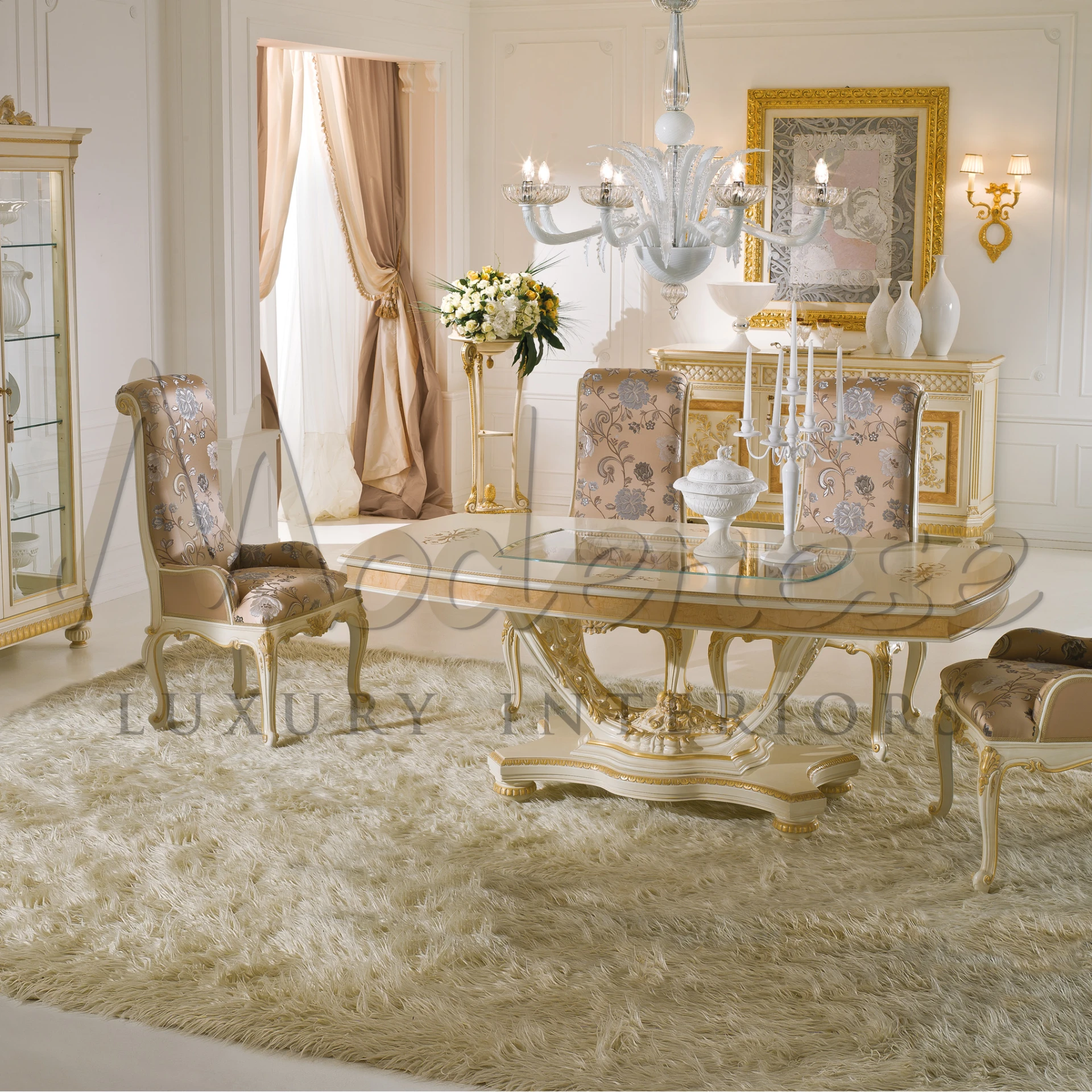 Luxurious dining room with stylish furniture and a crystal chandelier.
