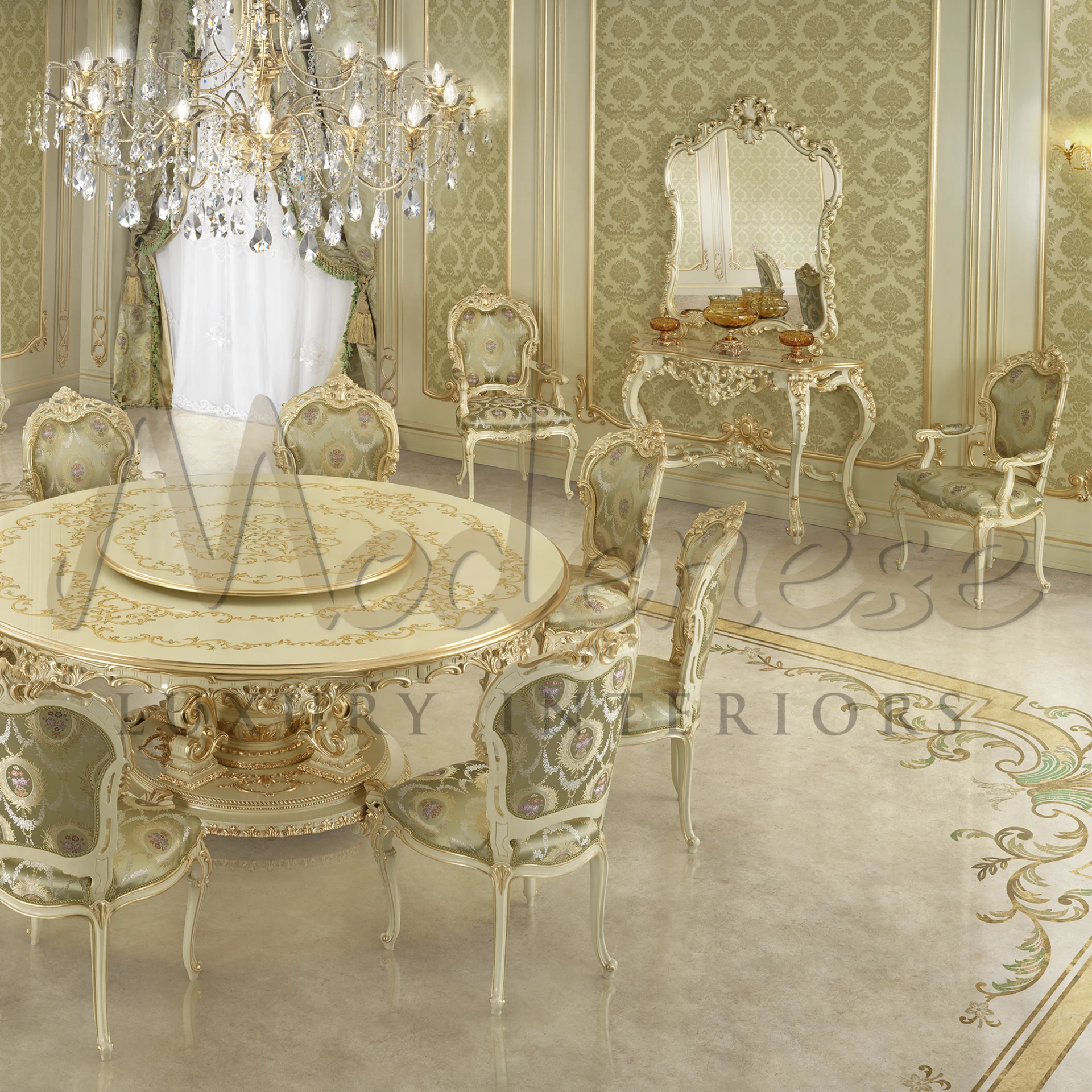 A luxurious room with crystal chandelier, a stylish round table surrounded by hand made Italian chairs, and elegant wall designs.