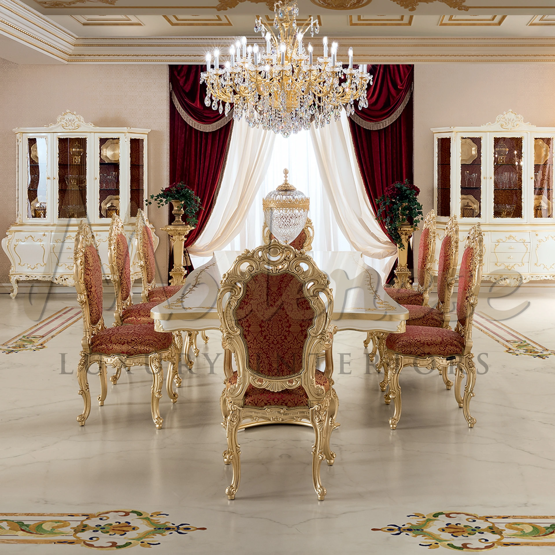 Luxurious dining space featured by a lavish chandelier, fancy golden chairs, and sophisticated white cabinet