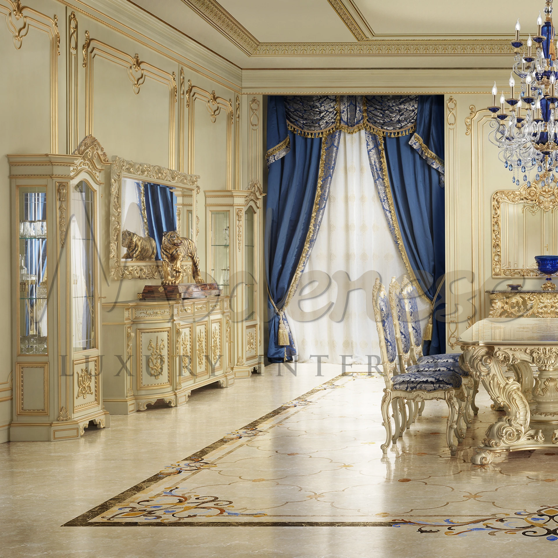 Luxury living room with stylish gold furniture, a striking mirror, and window with luxurious blue curtains