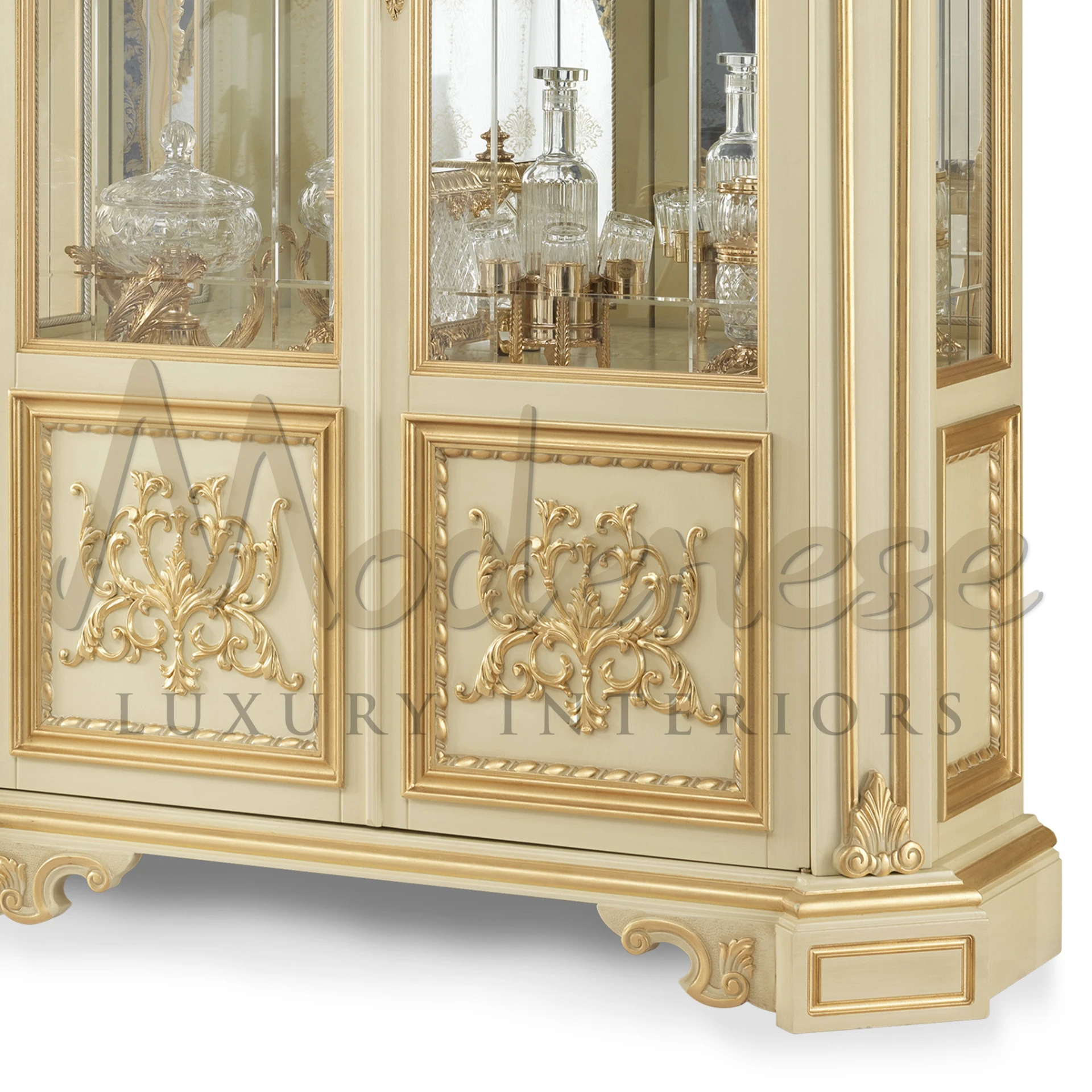 a close up view of the luxury ivory cabinet bottom showing fancy floral design