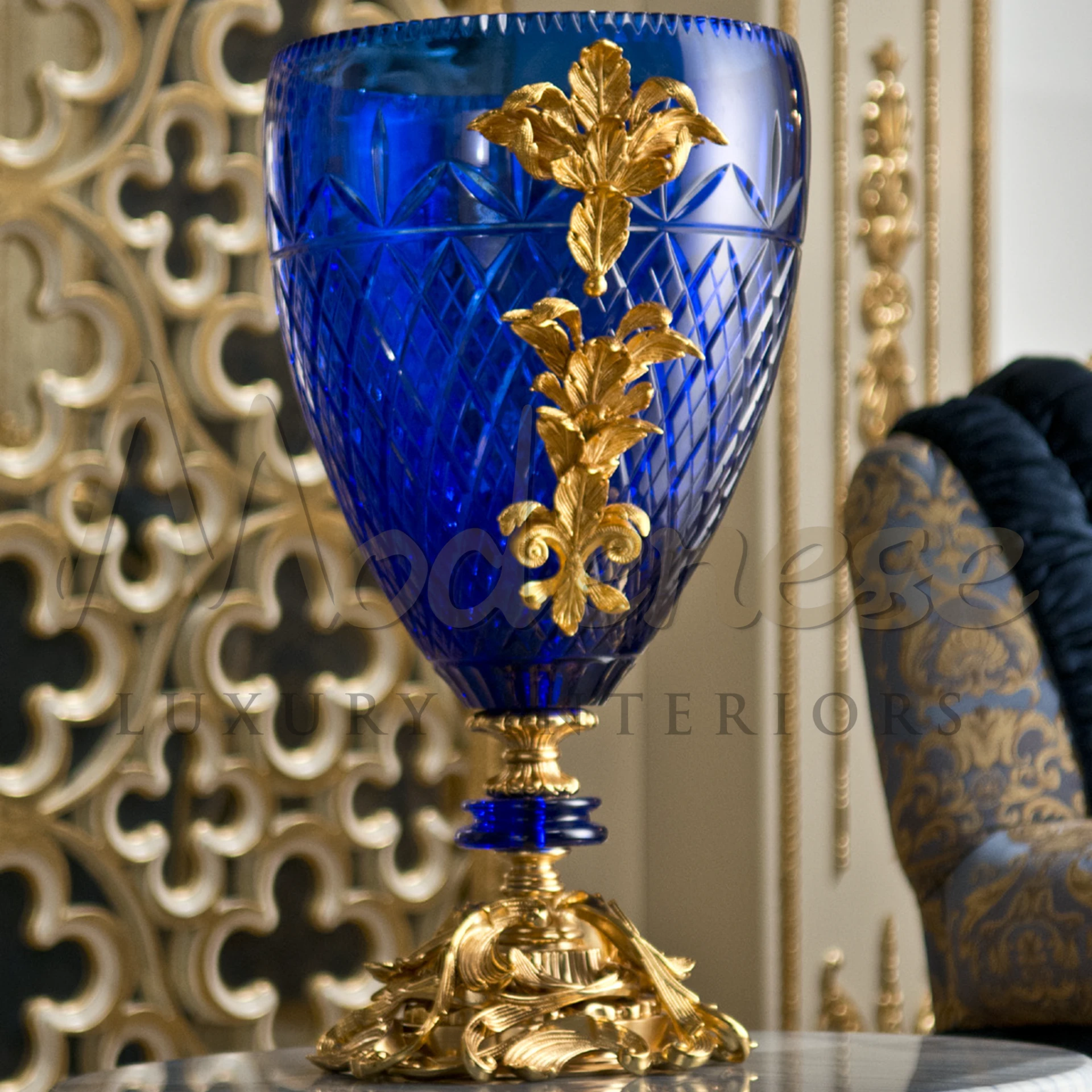 Elegant Blue Glass Vase, a luxurious statement piece, adding a touch of refinement and style to any interior setting.