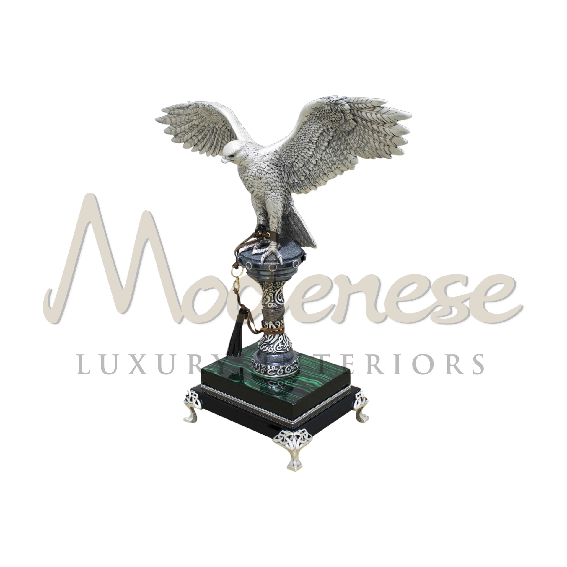 Imperial Falcon Statuette, crafted with grandeur, featuring detailed feather patterns and regal finishes, symbolizes power and elegance in luxury home décor.