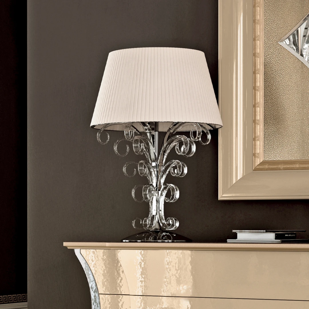 Add warmth and style to your space with our exquisite table lamps, perfect for providing task lighting or creating cozy corners.