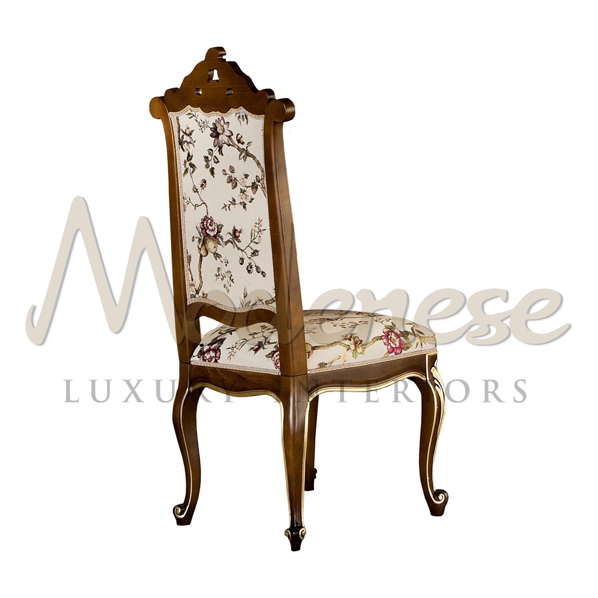 Discover high-end palaces with Modenese Furniture's mission. This chair features a classic walnut finish, gold leaf details, and floral-patterned upholstery.