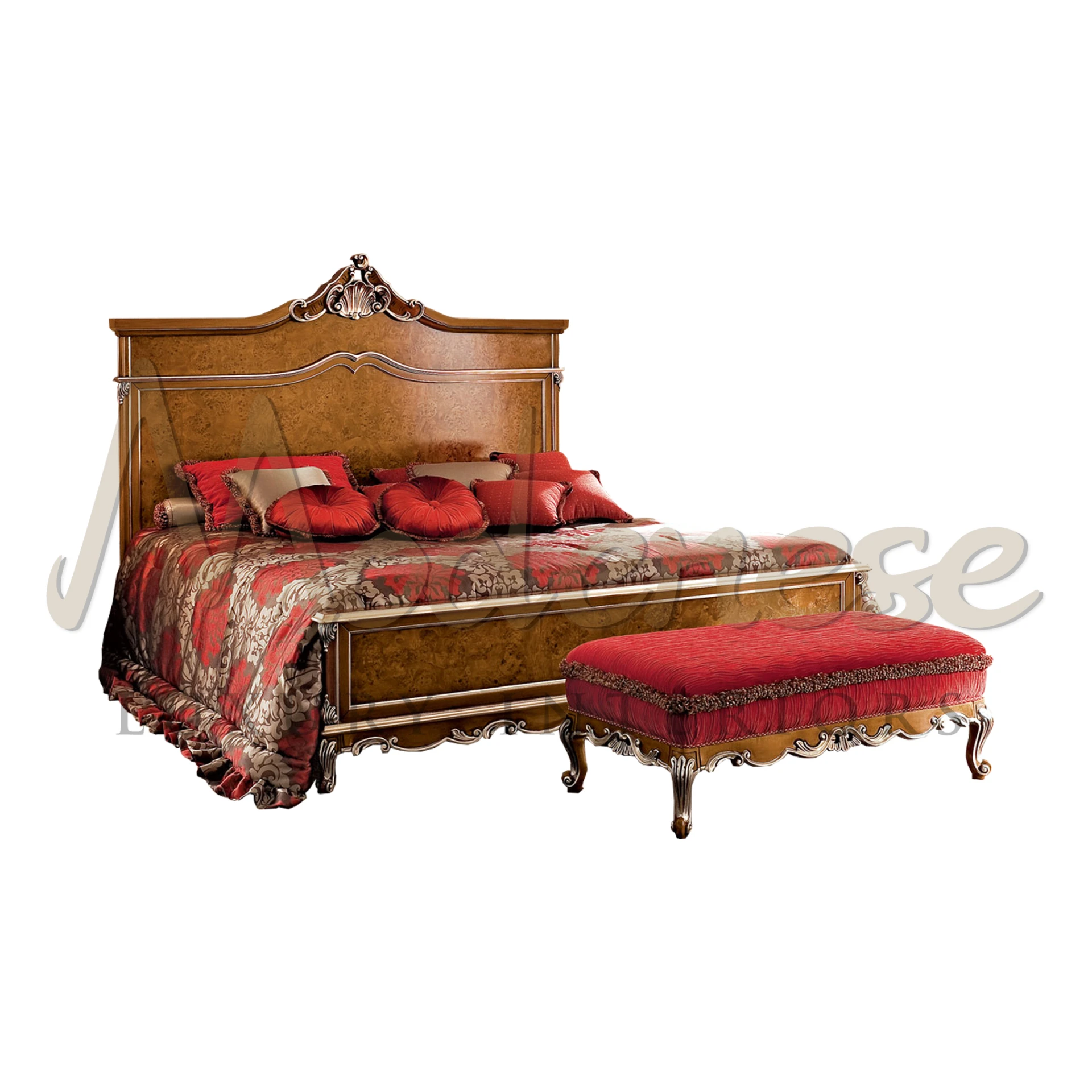 A classic wooden bed produced by Modenese Furniture Manufacturer with a curved headboard and rich red bedding, accompanied by a matching ornate bench.