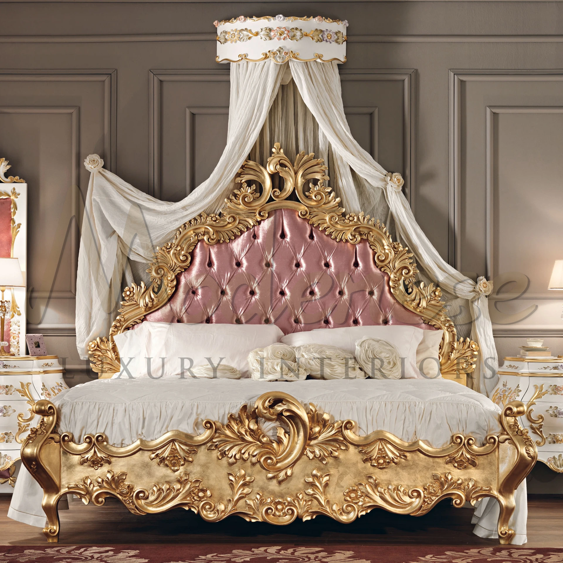 Luxurious canopy bed with pink tufted headboard and gold frame created by Modenese Furniture, draped with sheer curtains against a paneled wall.