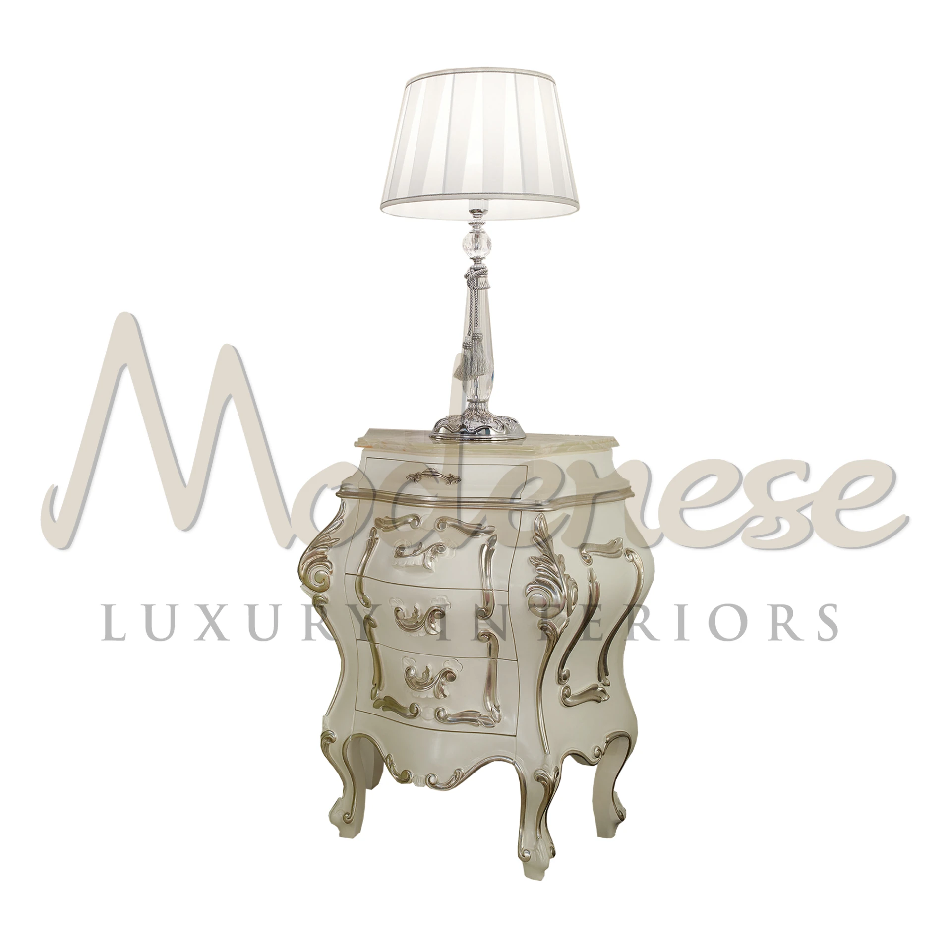 Opulent Modenese nightstand in a cream hue, showcasing baroque craftsmanship with detailed curves and a stylish silver table lamp, embodying Italian luxury.